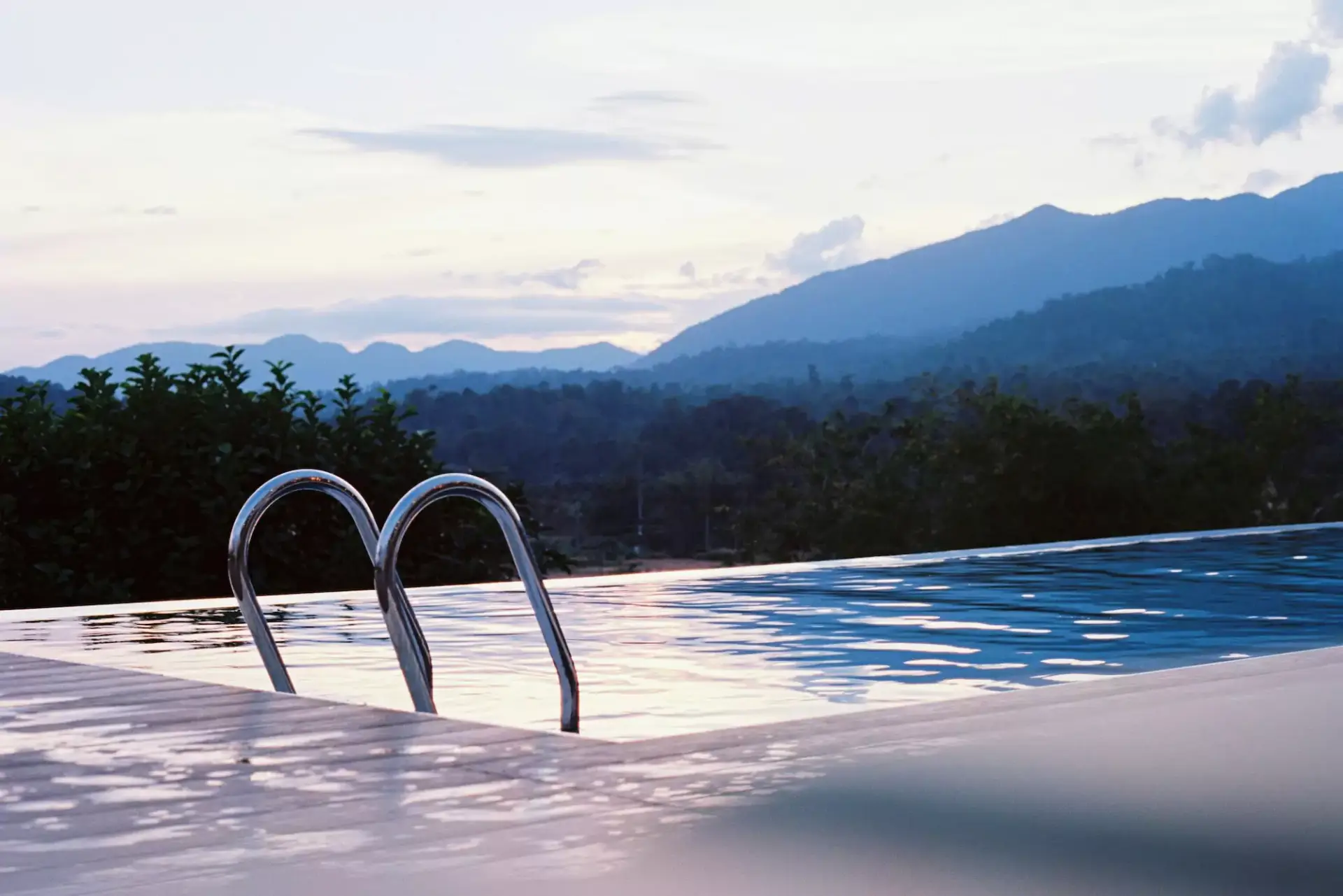 Container pool with mountains in background